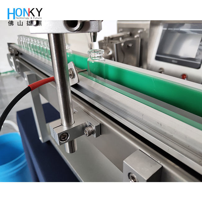 نوع المكتب تصنيع المجموعات الصغيرة آلة ملء الكريم السائل مع ناقل للمستحضرات التجميلية لتعبئة المجموعات الصغيرة